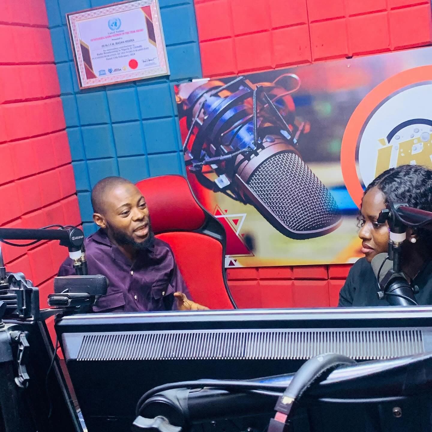 A GigsTech team member being interviewed on radio